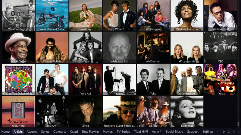QSYNC Media Player artists library, a full-screen grid of artist photographs from Weather Report through to Edith Piaf, each tile captioned with the artist name